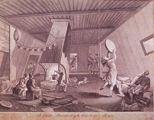 A Jakutian Priest invoking his dieties to cure a sick man