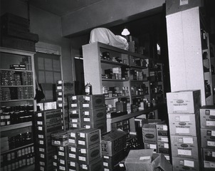 Albuquerque General Hospital: Storeroom for drugs and medical supplies is crowded but orderly