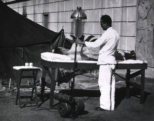 U.S. Army. General Hospital No. 21: Patient recerving treatment administered by means of equipment from the "Emergency Unit"