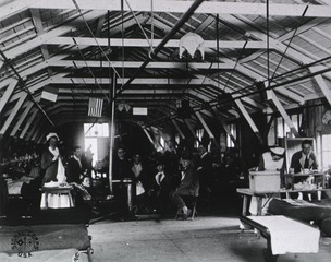 U.S. Army. Base Hospital No.12, Dannes-Camiers, France: Interior view...Adrian Hut with wounded soldiers getting ready for Christmas