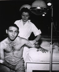 U.S. Army, Fletcher General Hospital, Cambridge, Ohio: Wounded soldier receiving heat massage and muscle therapy