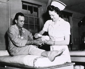 U.S. Army, Stark General Hospital, Charleston, SC: Physical therapist aide bandages a soldier's stump