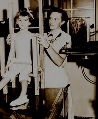 U.S. Naval Hospital, Oakland, CA: Nurse with child patient in x-ray room