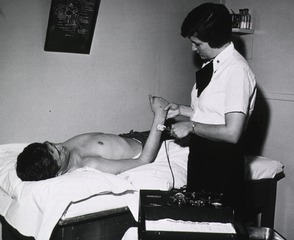 U.S. Naval Hospital, Oakland, CA: Electrical stimulation therapy to reducate paralyzed muscles