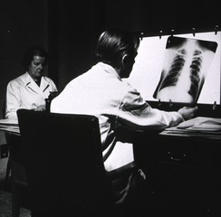 Middlesex Hospital, London, England: Radiologist examining x-ray