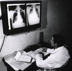 Middlesex Hospital, London, England: Technician examining x-rays