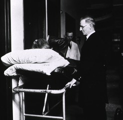 Middlesex Hospital, London, England: Patient on wheeled stretcher