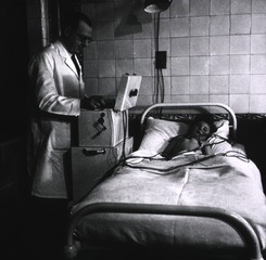 Middlesex Hospital, London, England: Doctor administering an electrocardiograph to child patient
