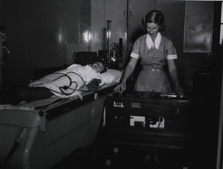 Hospital - Australia (Unidentified): Electro-cardiogram technician and patient