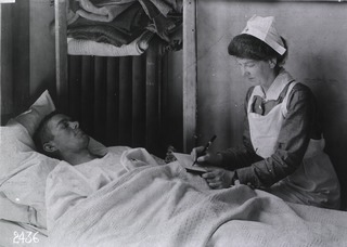 U.S. American National Red Cross Hospital No.1, Paris, France: Nurse writing letter for a wounded soldier
