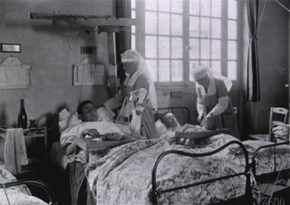U.S. American National Red Cross Hospital No.1, Paris, France: Nurses attending to wounded Americans