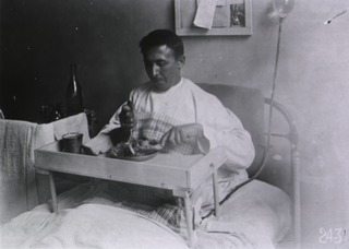 U.S. American National Red Cross Hospital No.1, Paris, France: Wounded soldier at meal time