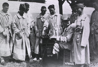 U.S. American National Red Cross Hospital No. 5, Auteuil, France: Convalescent soldiers enjoying music and some time outdoors