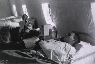U.S. American National Red Cross Hospital No. 5, Auteuil, France: Wounded soldiers resting and reading in one of the wards