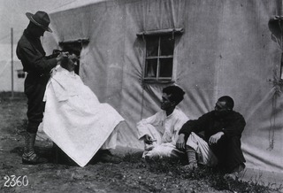 U.S. American National Red Cross Hospital No. 5, Auteuil, France: Patients at an open air barber shop outside of one of the tents