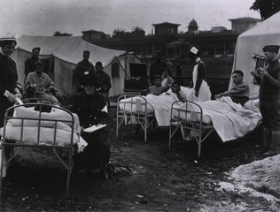 U.S. American National Red Cross Hospital No. 5, Auteuil, France: Wounded soldiers enjoying some air with some nurses in attendance