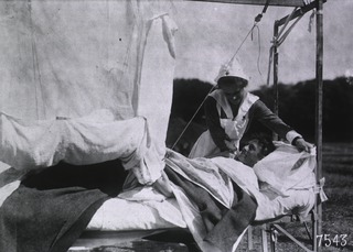 U.S. American National Red Cross Hospital No.5, Paris, France: Patient being attended to by nurse
