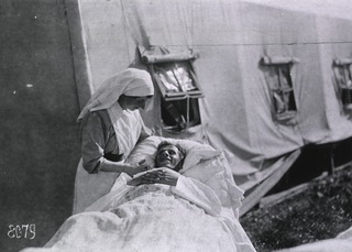 U.S. American National Red Cross Hospital No.5, Paris, France: Nurse with Patient at the Tent Hospital at Auteuil Race Track