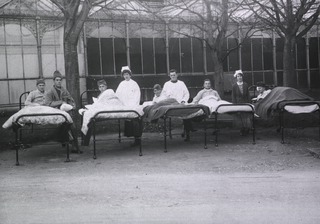 Great Britain, British Red Cross Society Voluntary Aid Detachment Hospital, Newton-Abbot, England: Patients in bed outside of ward