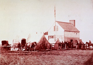 U.S. Sanitary Commission, Brandy Station, Alexandria, Va: Exterior view of Building and Tents
