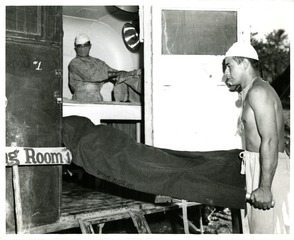Mobile medical units - Military: Loading a wounded marine into a mobile operating room