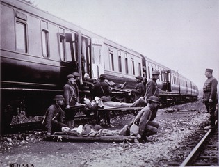 Hospital Trains: View showing wounded being loaded on to Hospital Train [France]