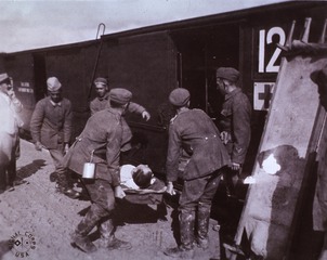 Hospital Trains: German prisoners loading American wounded [France]