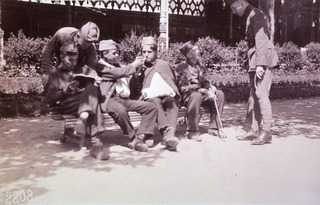 U.S. American National Red Cross: French and American wounded enjoying the sunshine in the gardens of the ARC Hospital