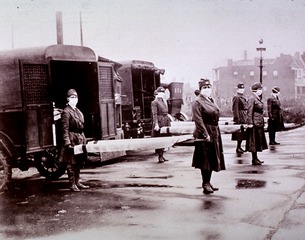 U.S. American National Red Cross: Nurses with stretchers at ambulances