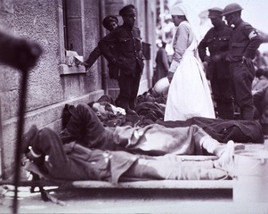 U.S. American National Red Cross: Red Cross Nurses caring for British and French wounded at railroad station in Montmirail, France