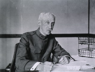 [Col. Bushnell in his office]