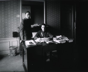[Lt. Glover (seated)]