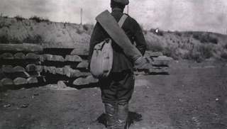 [A Russian soldier (rear)]