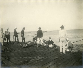 [Loading sick on boats for transfer to H.S. Relief at Arroya, Puerto Rico, Col. N. Senn and Genl. Terry on extreme left]
