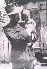 [Soldier with baby]