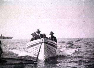 [Soldiers in boat]