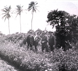 [Soldiers standing in a field]