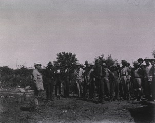 Group of Spanish Prisoners returning to their camp after bathing