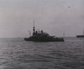 U.S. Battleship Oregon, taking on ammunition from a tug, at Siboney, Cuba
