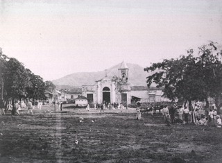 El Caney, looking towards Church, filled with Spanish prisoners