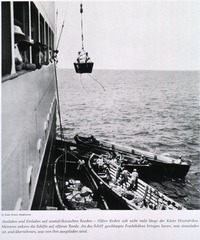 [Albert Schweitzer]: [Ship loading and unloading supplies off the coast of Africa]