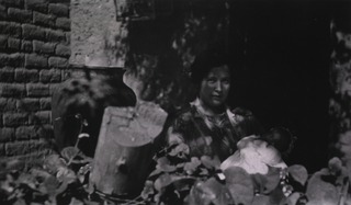 [Mexican woman with baby which was delivered by medical officers from Field Hospital No. 7]