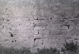 Bullet-marked posterior wall of execution ground