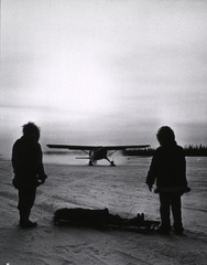 Landing of a flying ambulance near a lonely dwelling in Canada's north