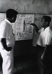 ... briefs a young doctor on the characteristics of Aedes aegypti