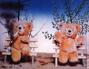 [Two teddy bears]