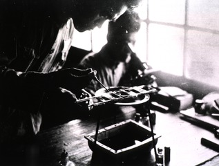 Army medical officers staining bacteriological specimen