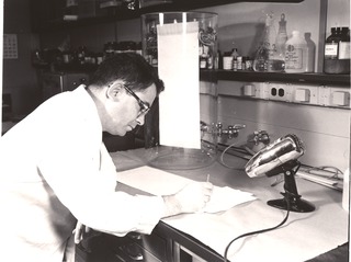 [A scientist studies the composition of an unknown substance by paper chromatography]
