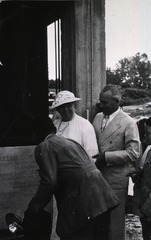 [Mrs. Luke Wilson and Surgeon General Thomas Parran assist in laying cornerstone of Building 1]