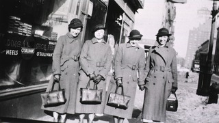 [Four nurses in uniform and carrying their bags]